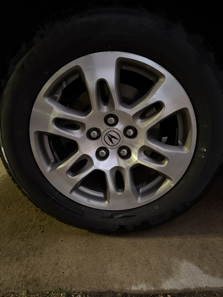 Acura wheel closeup after detail